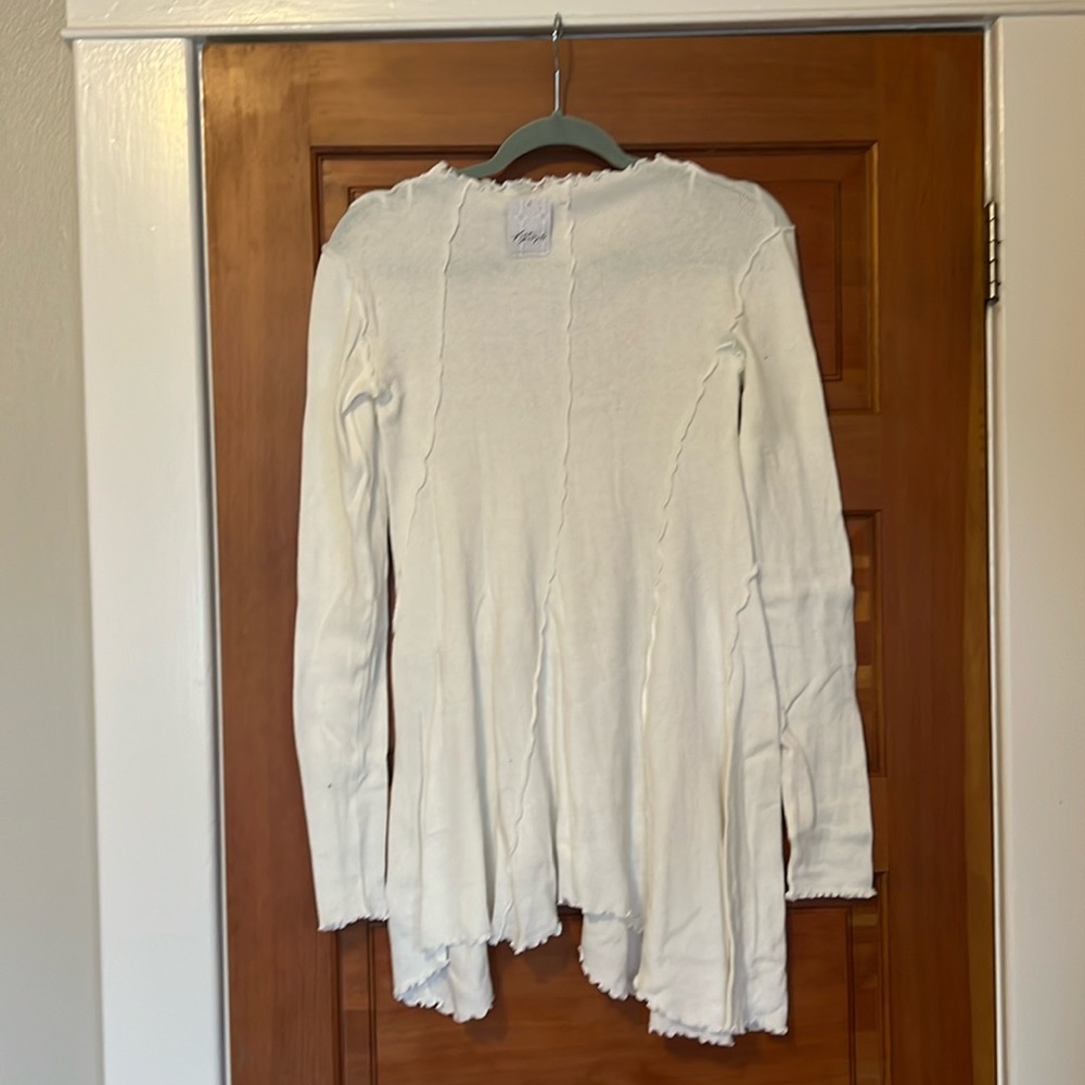 Free People. Super soft, brand new tunic. Loose fit with high neck. Small